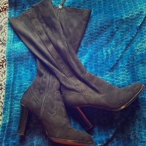 Black knee high heeled boots